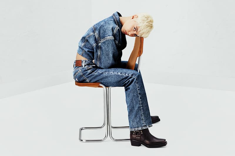 iris law model guess jeans sofa denim girl lying