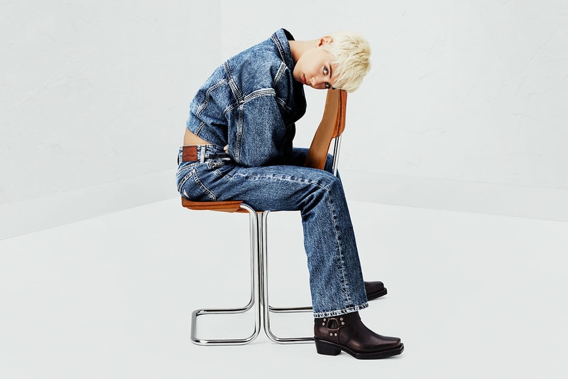 iris law model guess jeans sofa denim girl lying
