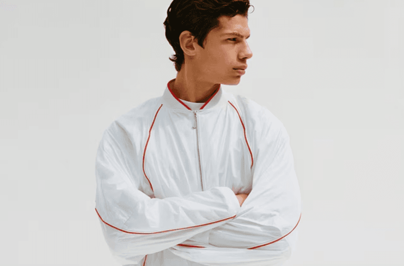 jacquemus nike sportswear clothing swoosh bags navy blue red tops skirts zip woman model