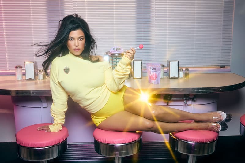 lemme kourtney kardashian lollipop laying down woman red latex dress