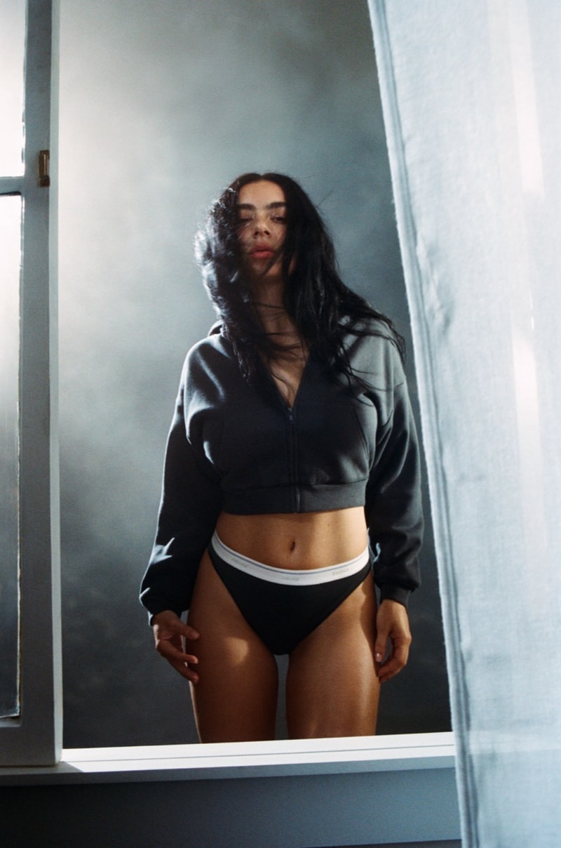charli xcx woman wet bra lingerie garden skims kim kardashian