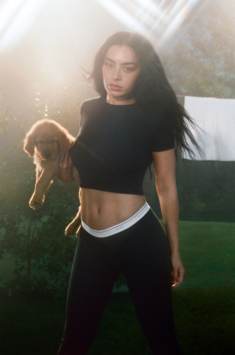 charli xcx woman wet bra lingerie garden skims kim kardashian