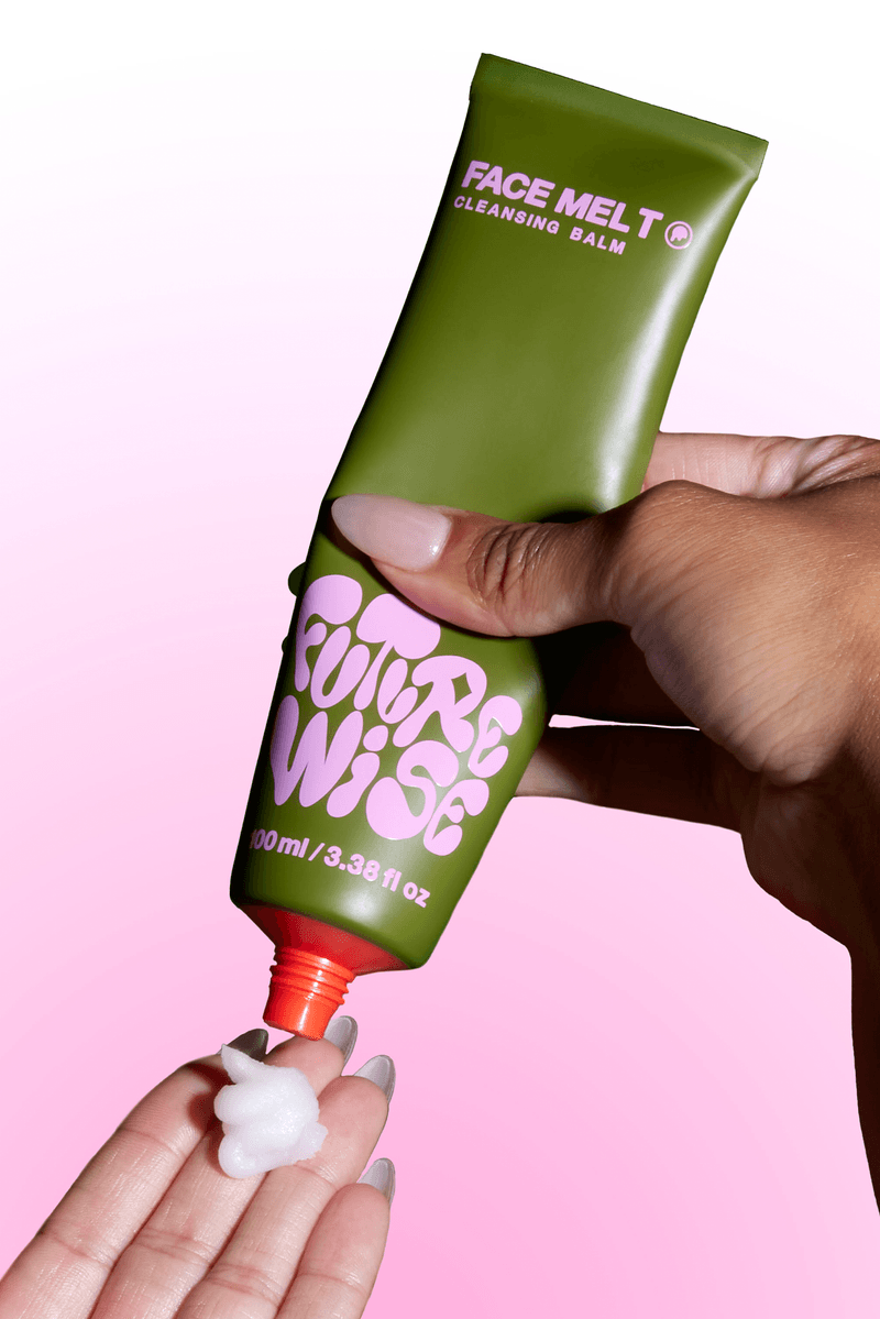 futurewise, korean skincare, slugging, woman with bright makeup wiping her band on face, cleanser