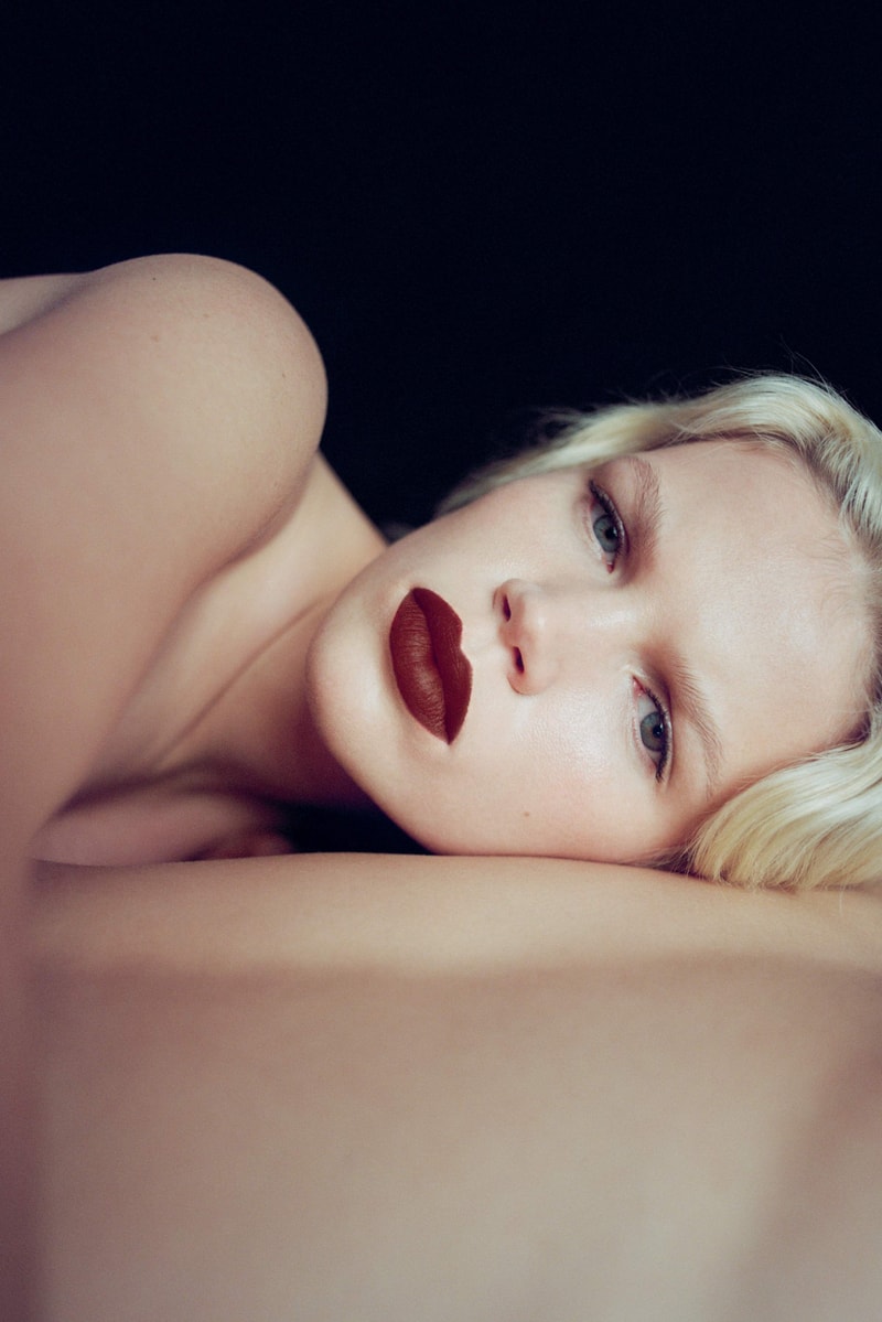 byredo, new lipstick launch, makeup, woman with red lipstick and makeup product on her chest