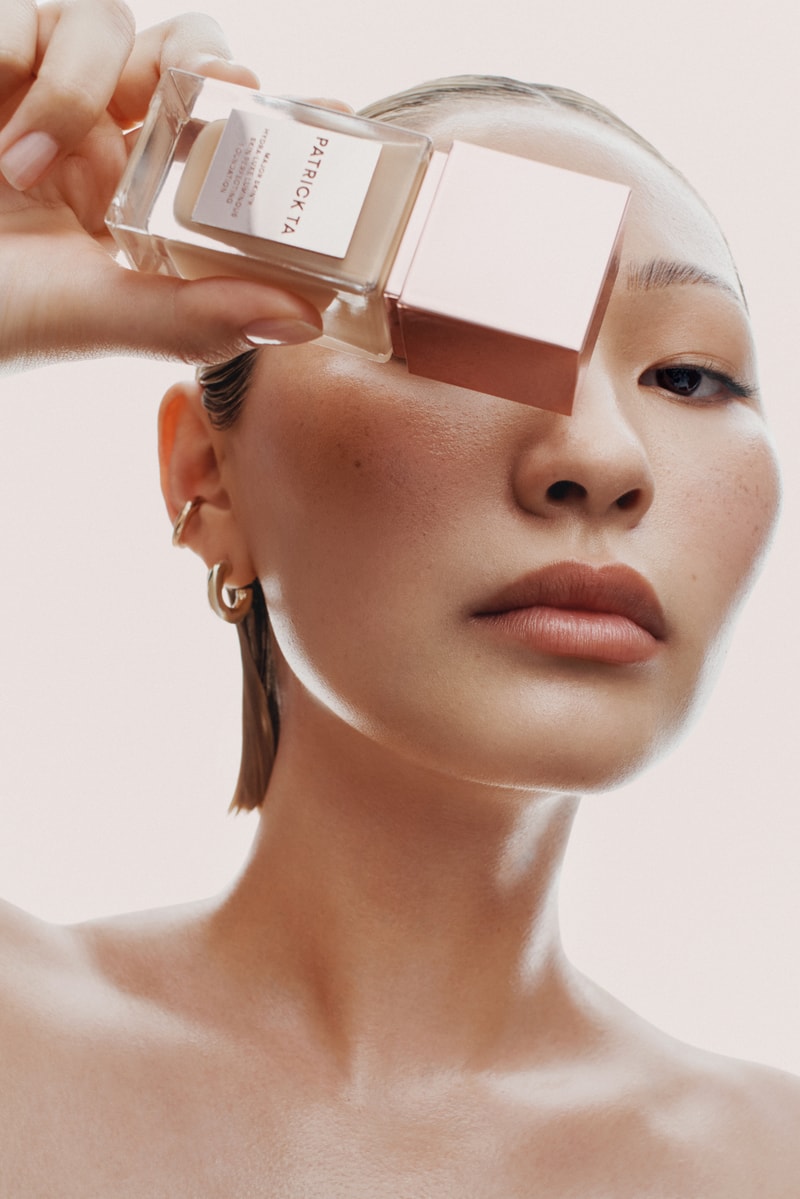Patrick Ta portrait, new foundation bottles stacked, makeup, skincare