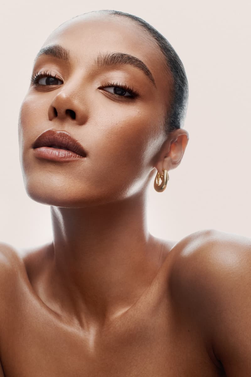 Patrick Ta portrait, new foundation bottles stacked, makeup, skincare