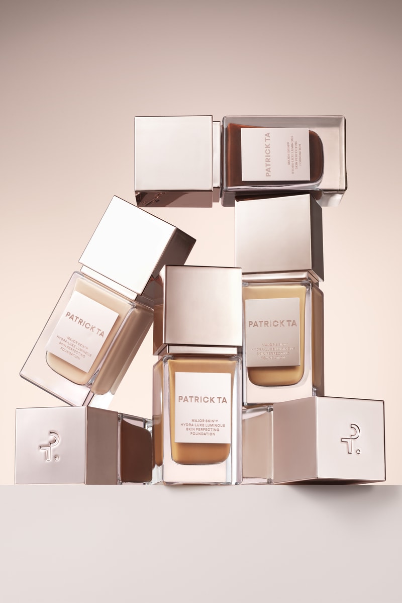 Patrick Ta portrait, new foundation bottles stacked, makeup, skincare