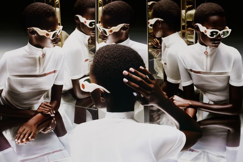 alex consani trans model girl blonde black dress gold jewelry