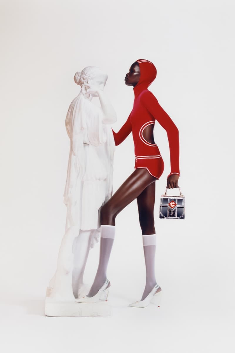 alex consani trans model girl blonde black dress gold jewelry