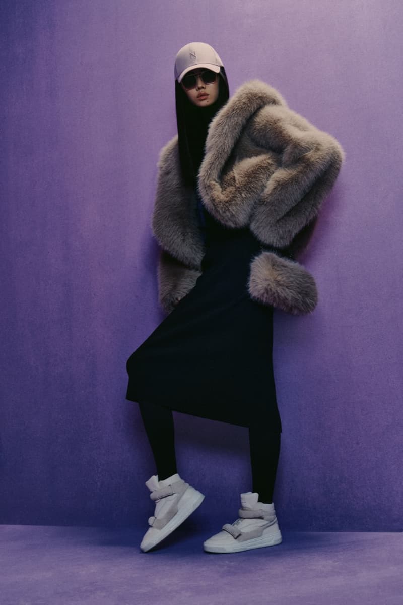 naomi campbell boss girl boy hat fluffy pink coat fur lilac background