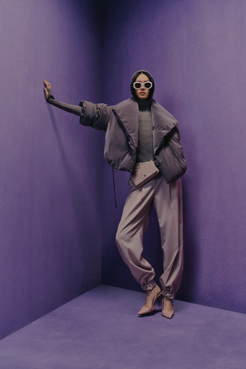 naomi campbell boss girl boy hat fluffy pink coat fur lilac background