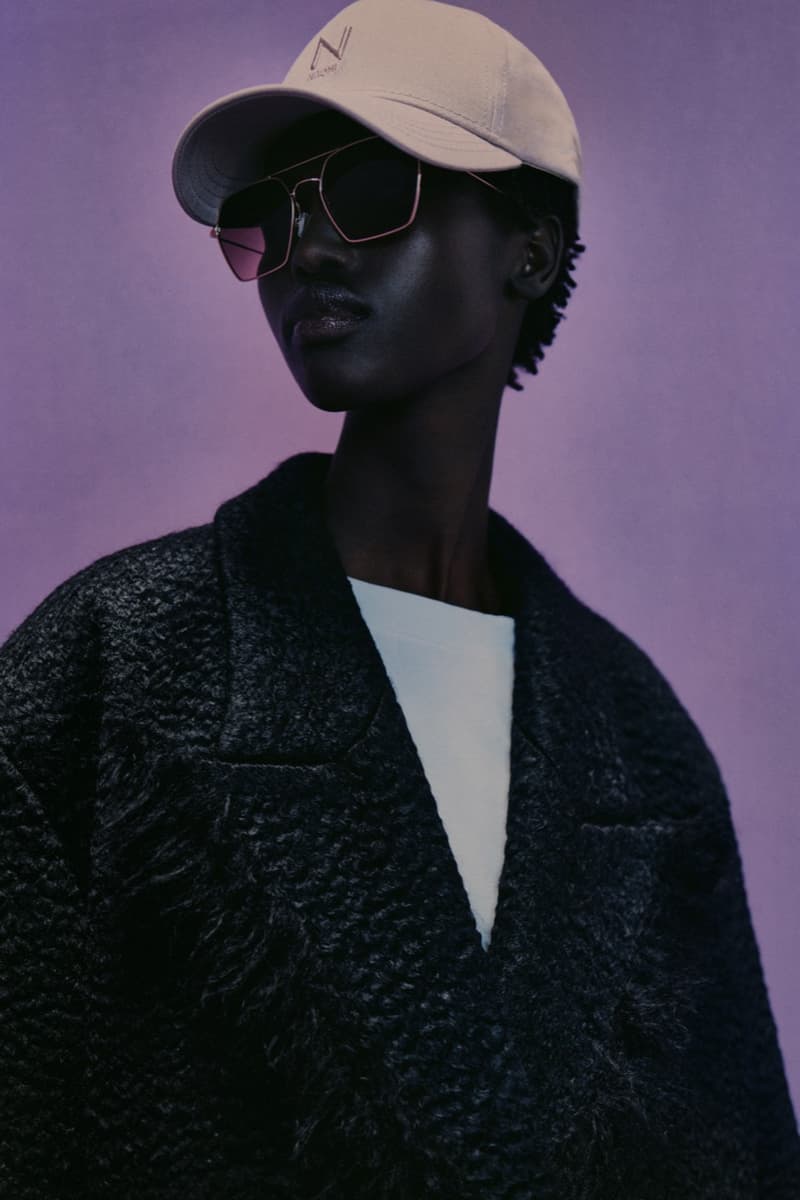 naomi campbell boss girl boy hat fluffy pink coat fur lilac background