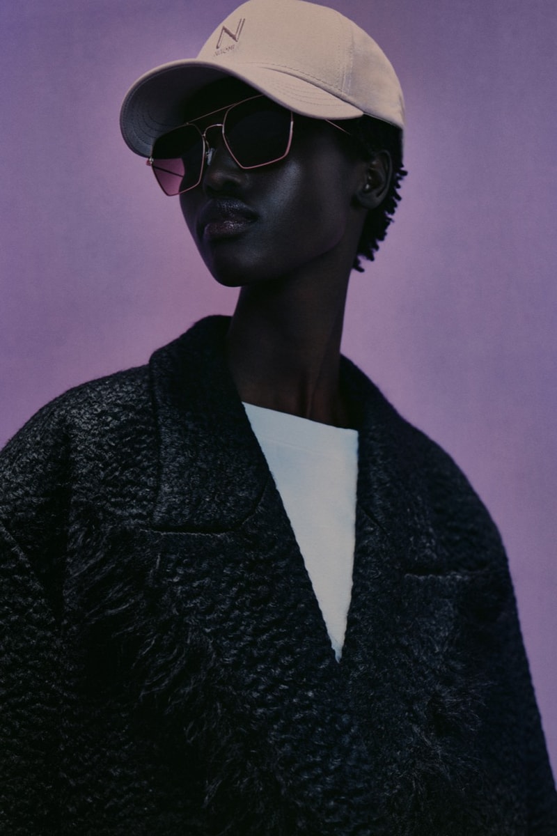 naomi campbell boss girl boy hat fluffy pink coat fur lilac background