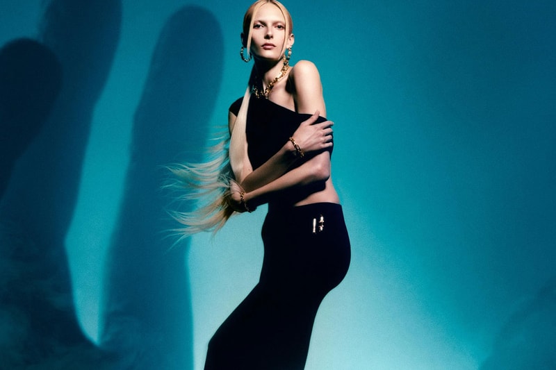alex consani trans model girl blonde black dress gold jewelry