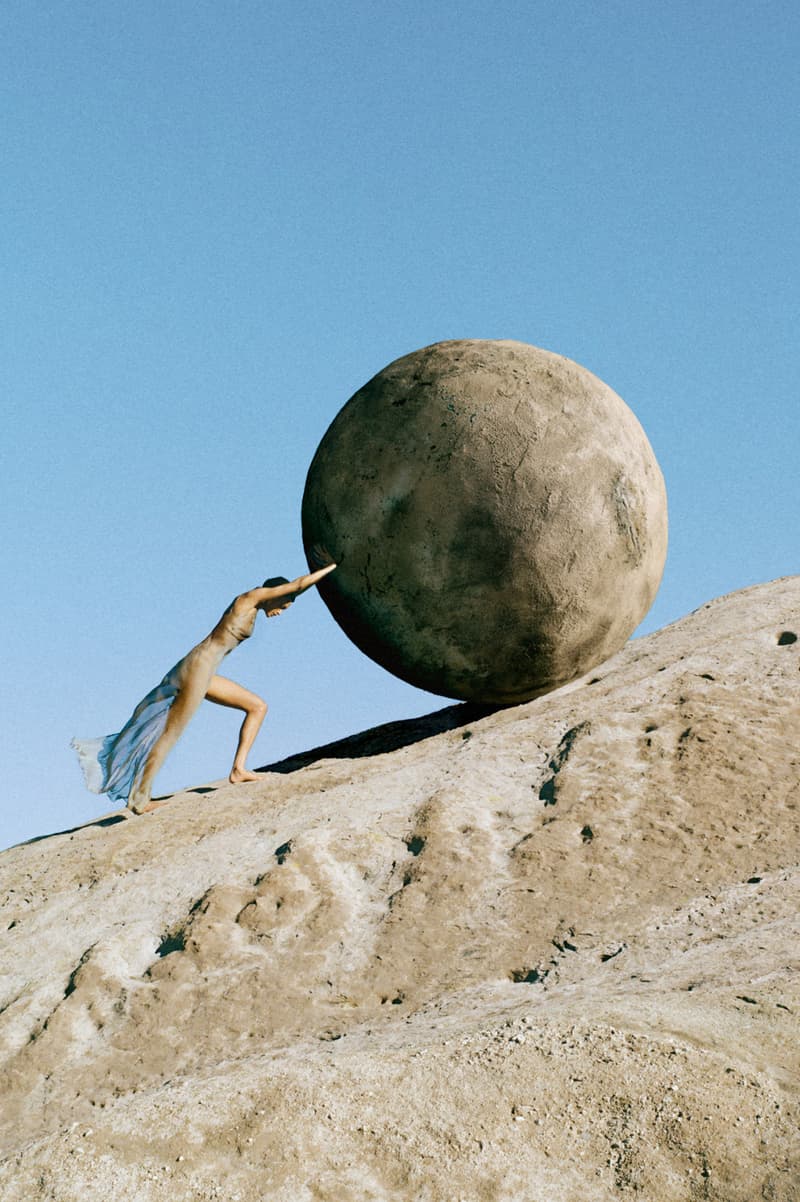 woman lying down in desert in sage colored dress, cult gaia, fragrance launch