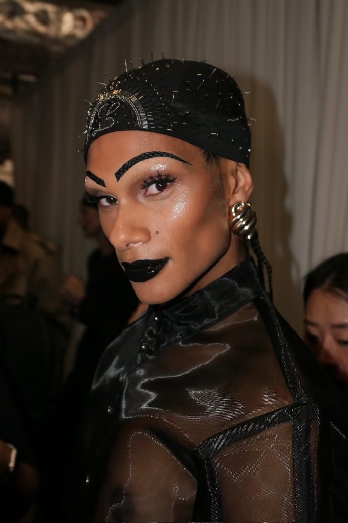 woman with sculpted, gel hair getting her makeup done, luar, ss25, fashion week, tresemme, mac cosmetics