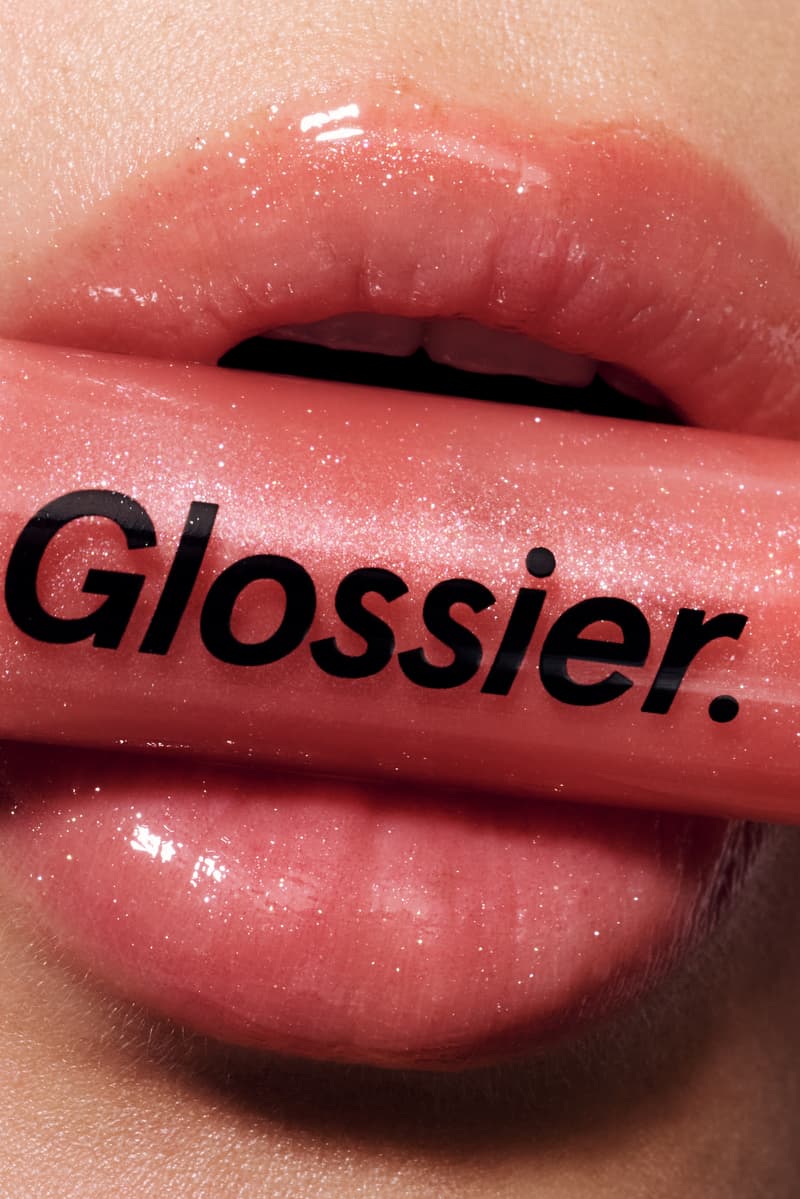 women sitting down posing with basketballs, wnba, glossier lip gloss, beauty, makeup