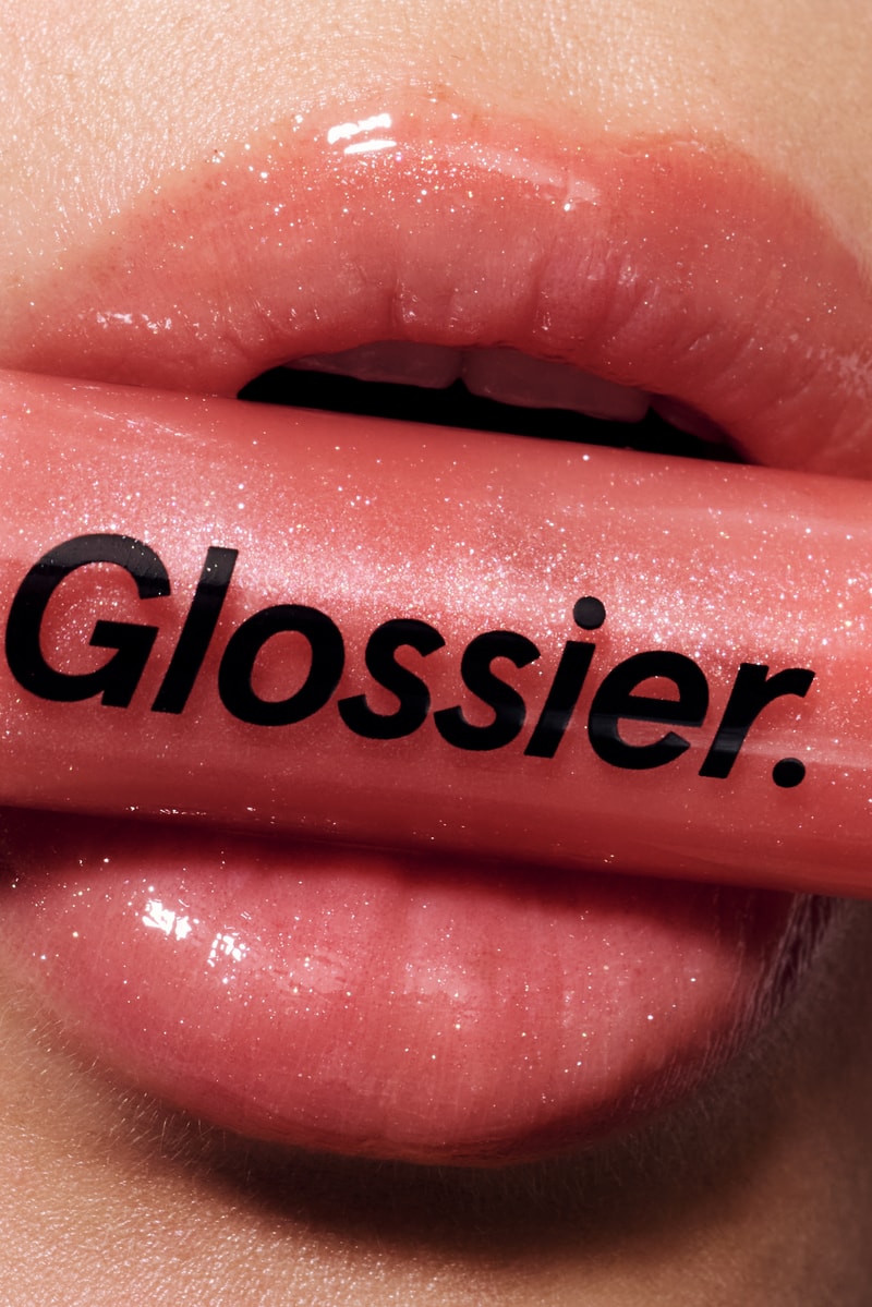 women sitting down posing with basketballs, wnba, glossier lip gloss, beauty, makeup
