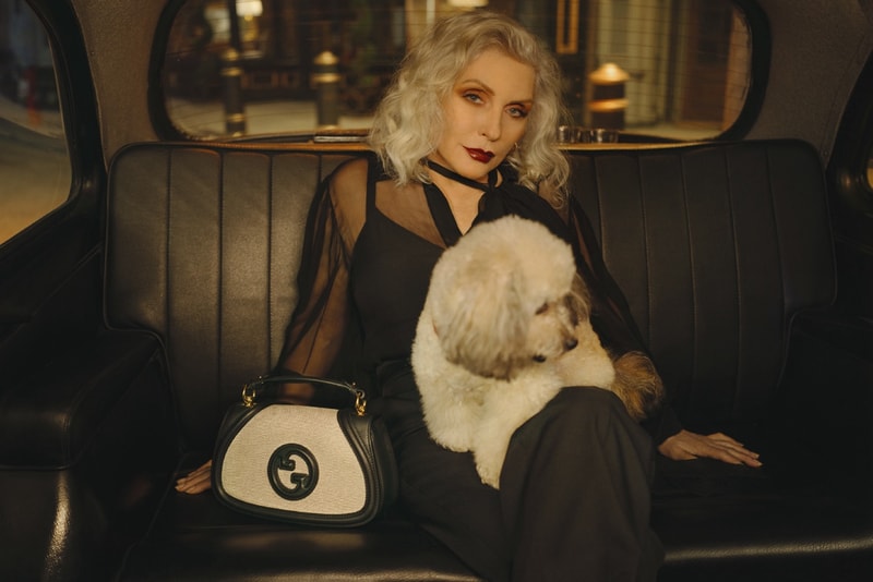 gucci blondie kelsey lu woman body red background suede brown bag