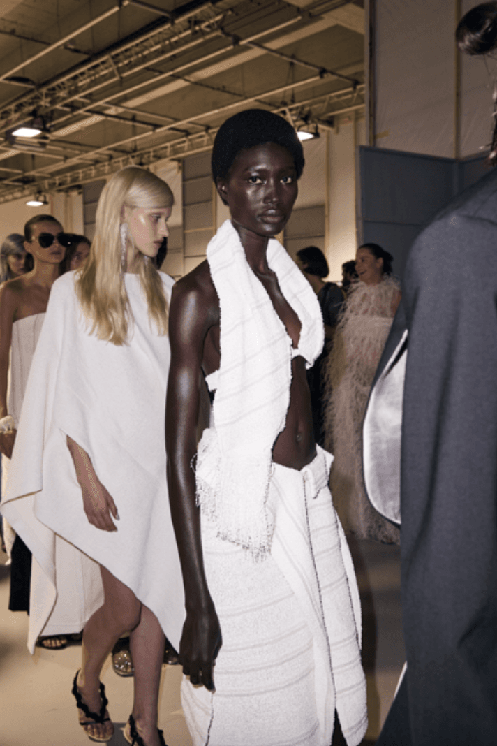 woman in white dress backstage, refy makeup, christoper esber, beauty, paris fashion week, spring/summer 2025