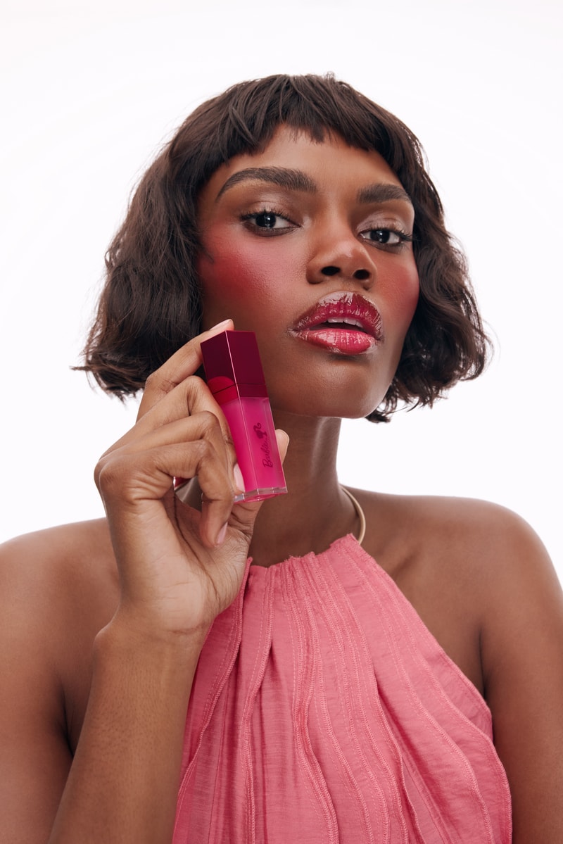 model wearing pink dress, patrick ta x barbie collection, makeup