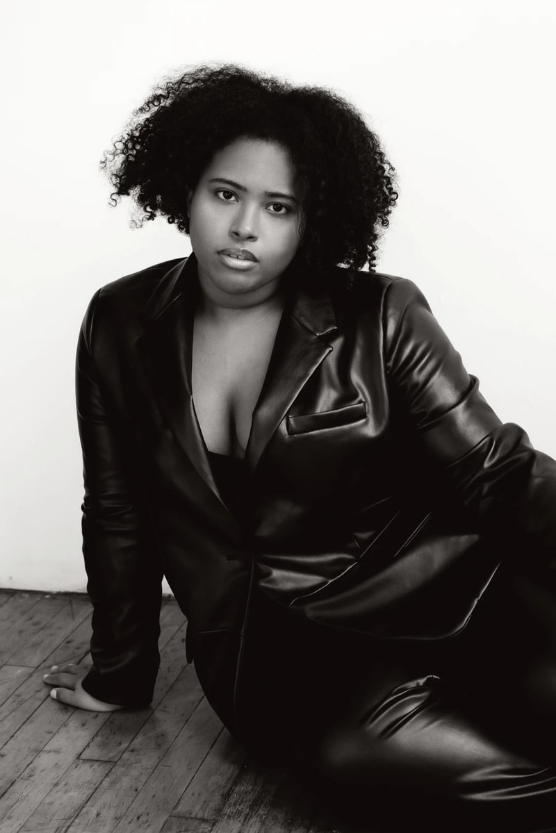 niamarie vargas posing in black and white photo, gen-z skincare brand, heavenly by nia, beauty