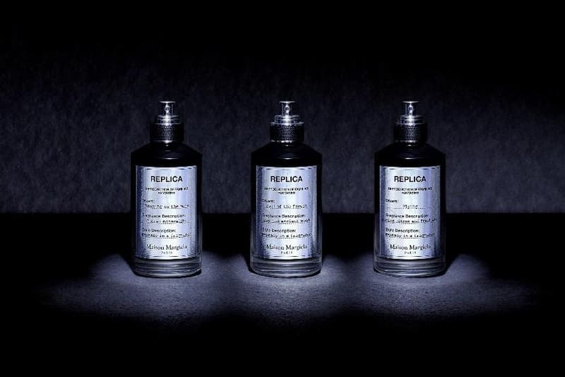 three new replica maison margiela fragrances side by side in dark room with light on them, perfume, beauty 