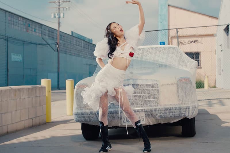 kitschy couture brand white ruffled clothing jennie kpop artist music girl car