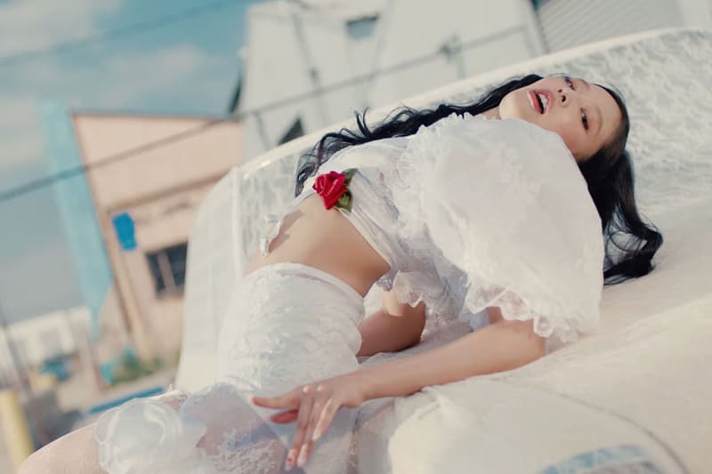 kitschy couture brand white ruffled clothing jennie kpop artist music girl car