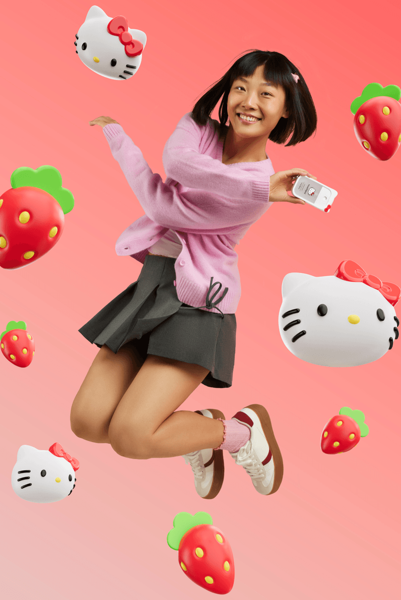 woman with bob surrounded by hello kitty sanrio touchland hand sanitizers, beauty, 50th anniversary