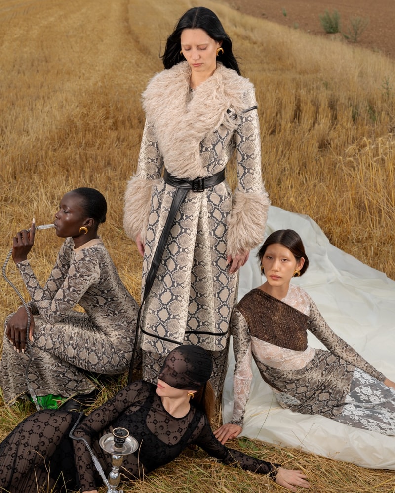 marine serre bodies people gathering ground grass crescent moon bodysuits flesh