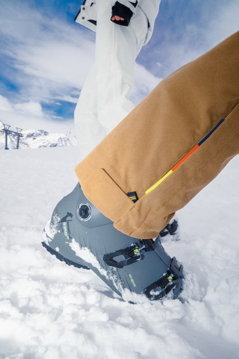 kway outdoor ski puffer snow people skiing purple yellow blue