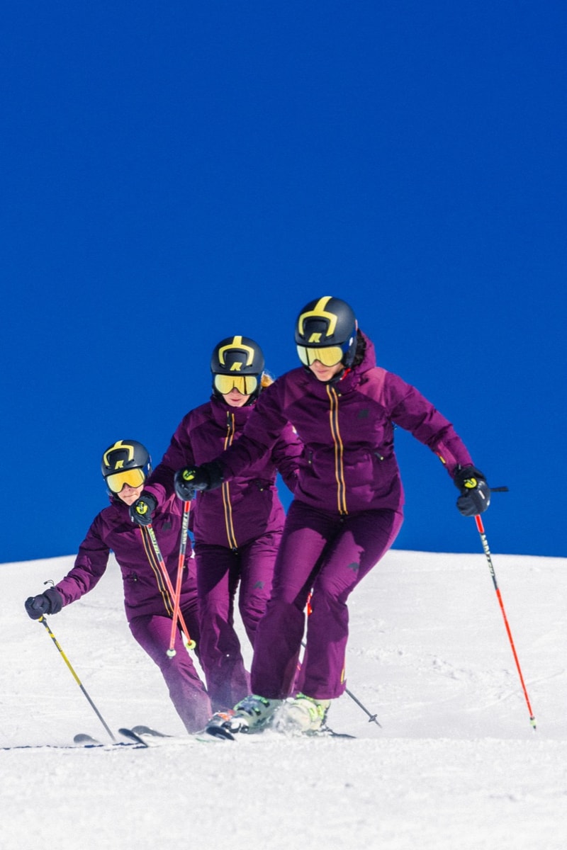 kway outdoor ski puffer snow people skiing purple yellow blue