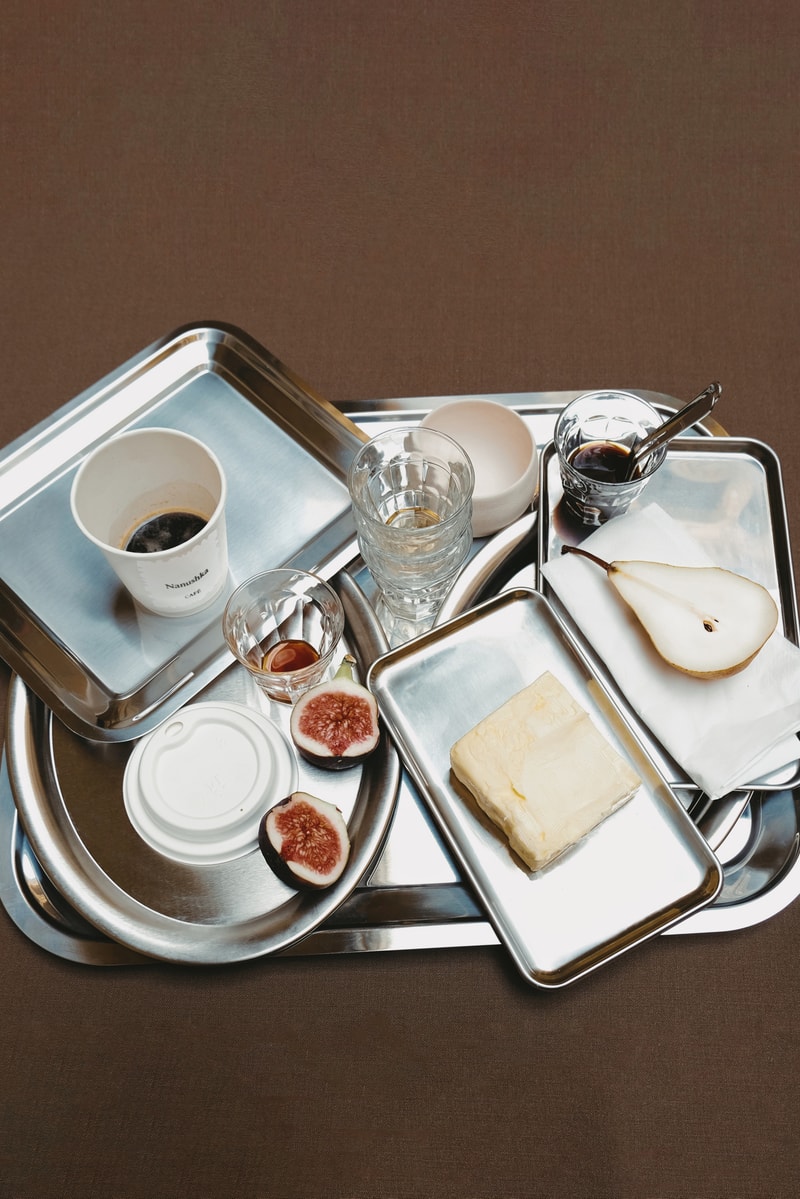 nanushka cafe coffee silver trays cups food 
