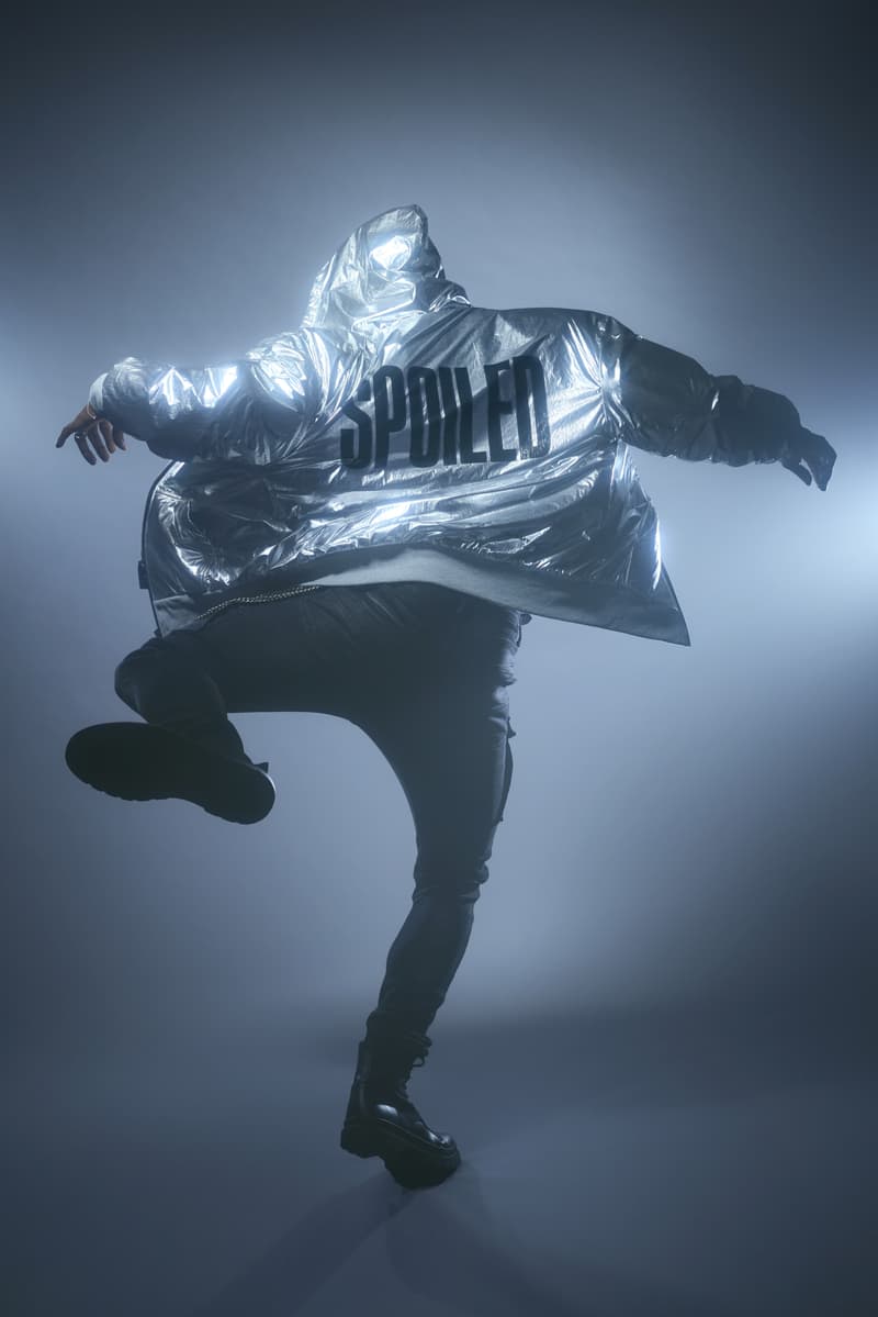 jeremy scott holding a silver rocketship filled with skincare, spoiledchild, moschino