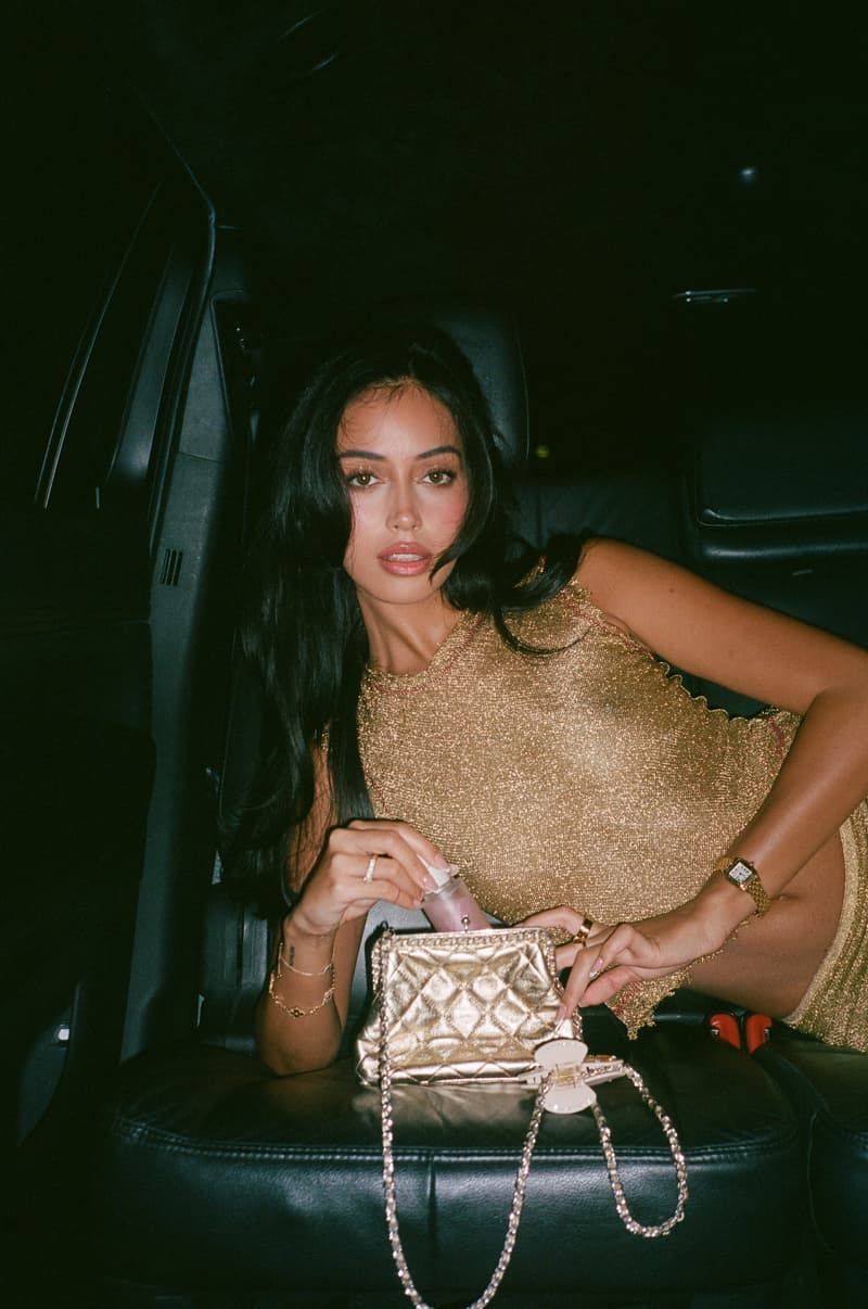 cindy wolfie kimberly posing on top of a car with emi jay halo hair oil, hair accessories, instagram famous models