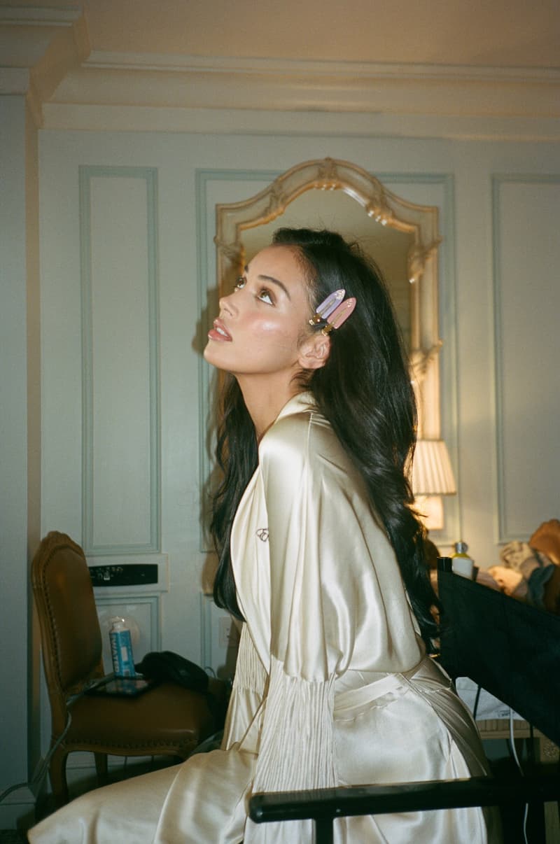 cindy wolfie kimberly posing on top of a car with emi jay halo hair oil, hair accessories, instagram famous models