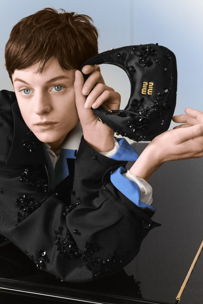 emma corrin miu miu christmas holiday jumper sofa knitwear