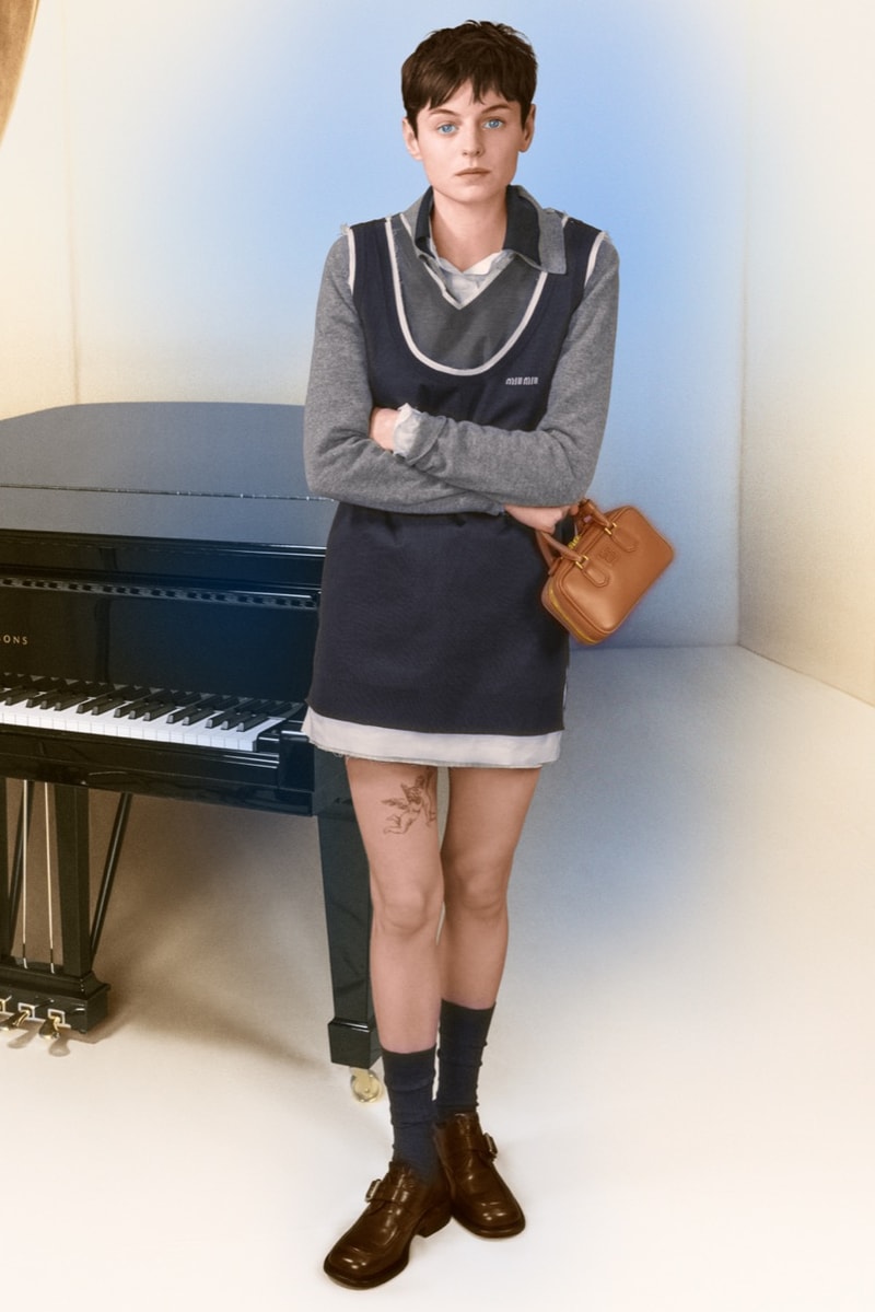 emma corrin miu miu christmas holiday jumper sofa knitwear