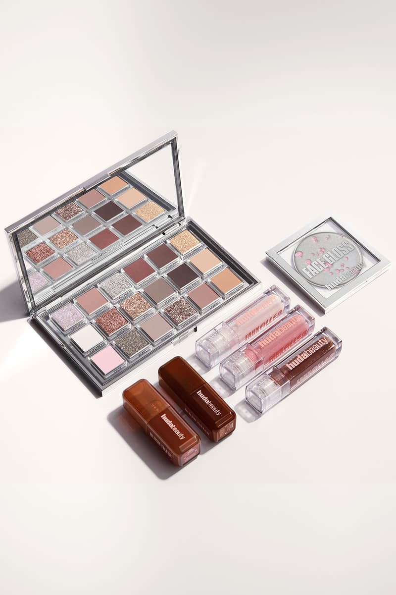 huda kattan posing with "icy nude" eyeshadow palette, huda beauty, makeup, middle east 