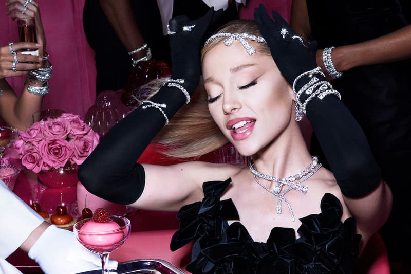 swarovski holiday jewelry diamonds ariana grande pink background black dress