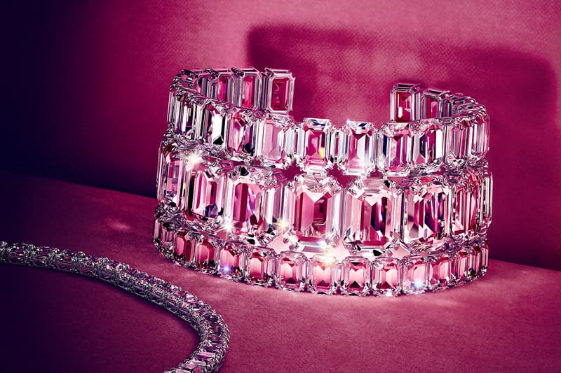 swarovski holiday jewelry diamonds ariana grande pink background black dress