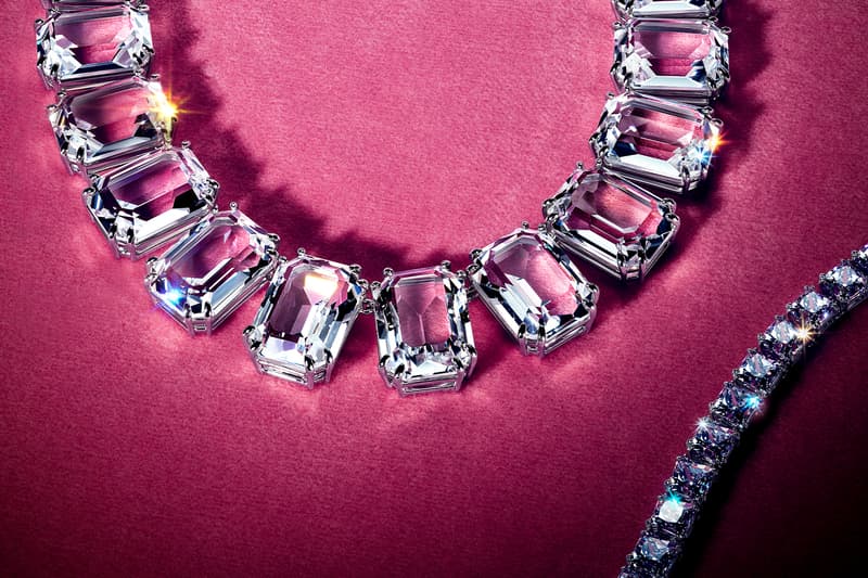 swarovski holiday jewelry diamonds ariana grande pink background black dress