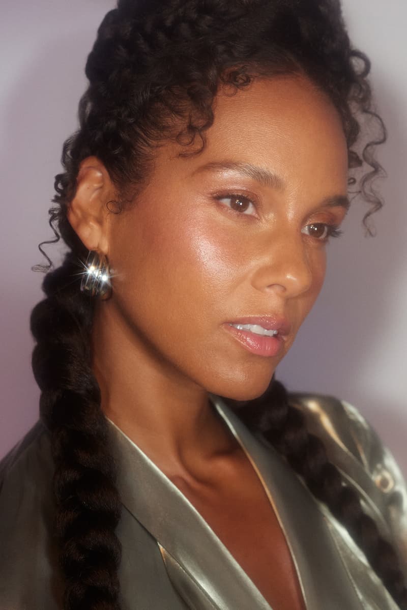 alicia keys posing with her new skincare serum let me glow, grammys, beauty 