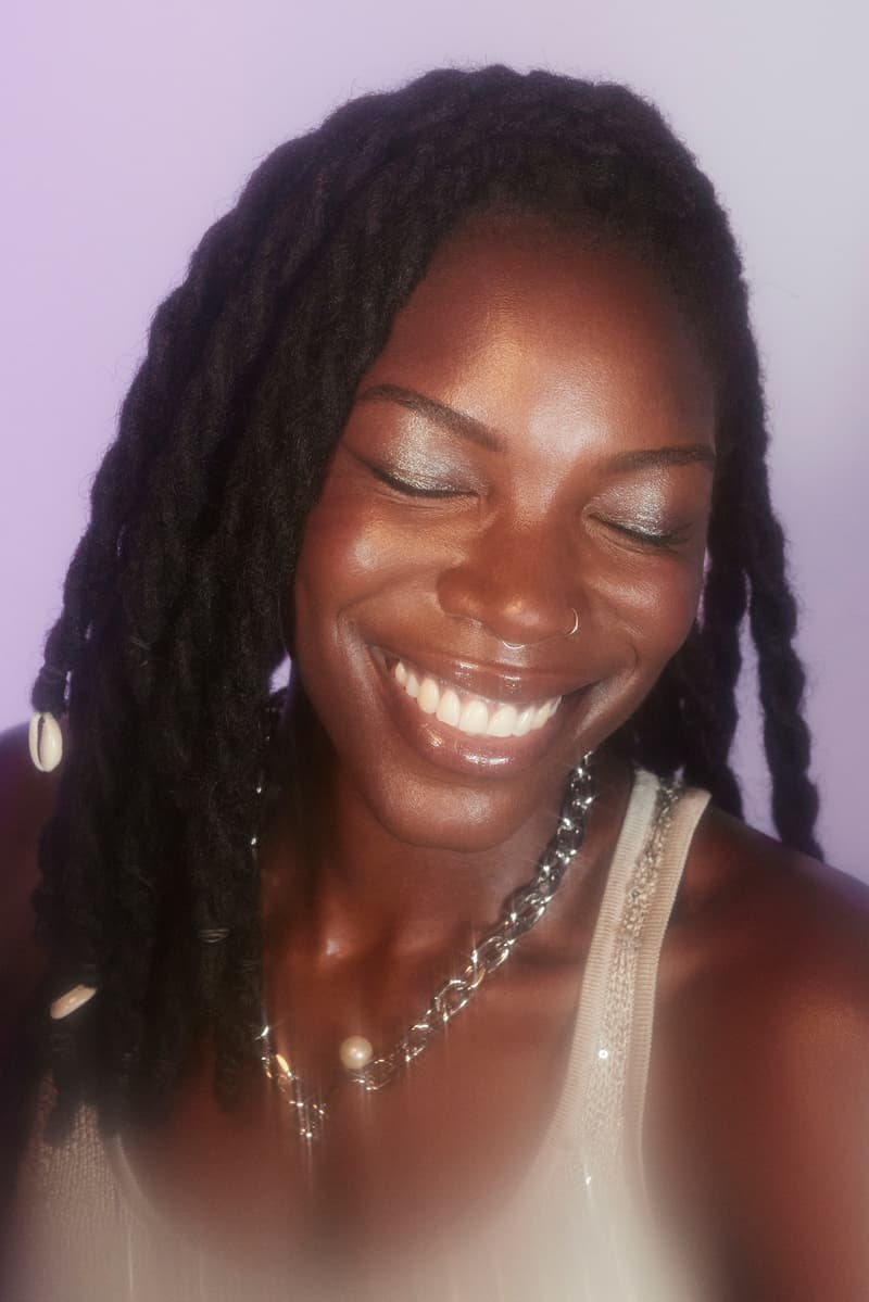 alicia keys posing with her new skincare serum let me glow, grammys, beauty 