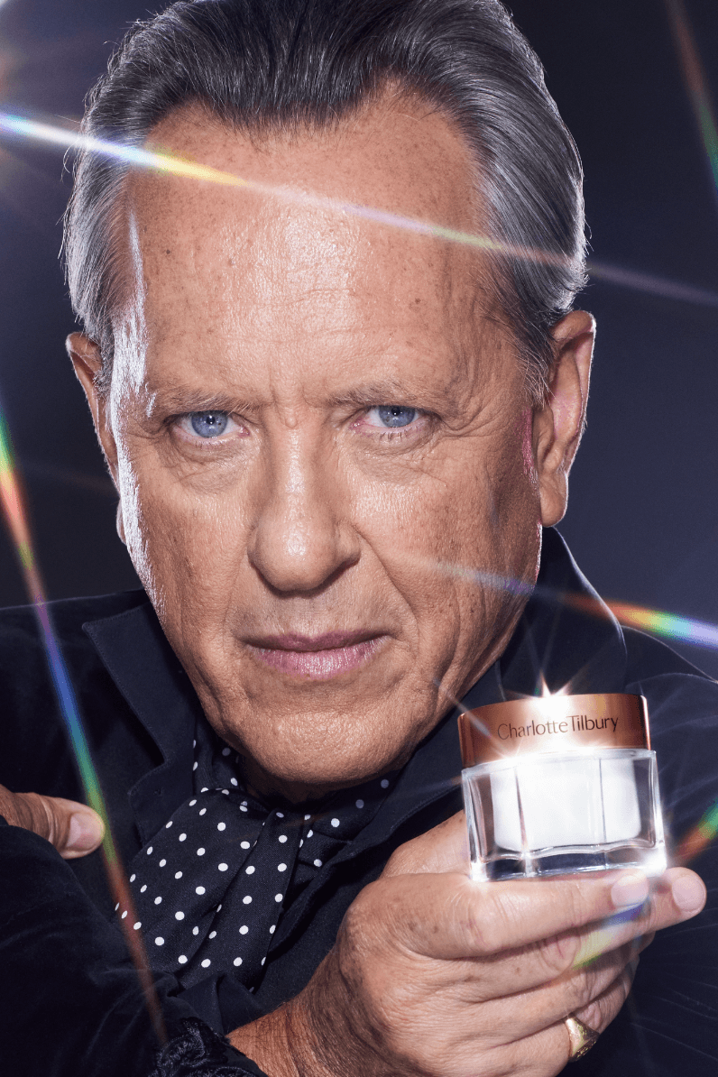 michaela jay posing with highlighter wand, charlotte tilbury holiday campaign, beauty, makeup 