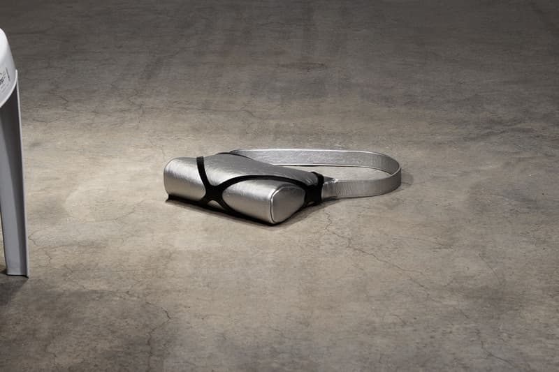 puppets and puppets brand bags woman floor legs leather black hair sunglasses