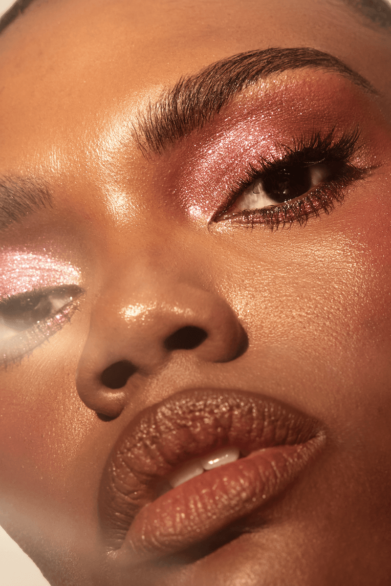 two woman wearing patrick ta eyeshadow and posing together, holiday makeup, beauty, makeup artist