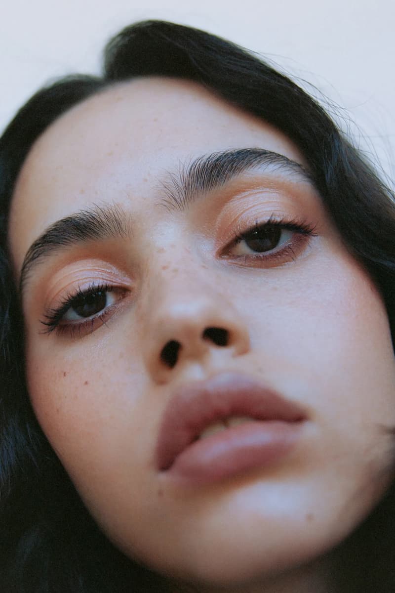 woman wearing manasi 7 new lip and eye defining pencil in the shade "nocturne," makeup, skincare, swedish beauty