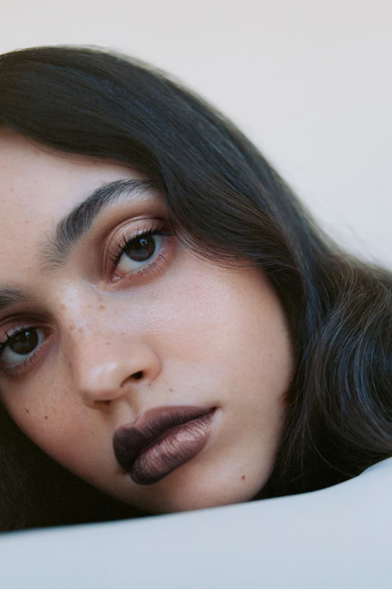 woman wearing manasi 7 new lip and eye defining pencil in the shade "nocturne," makeup, skincare, swedish beauty